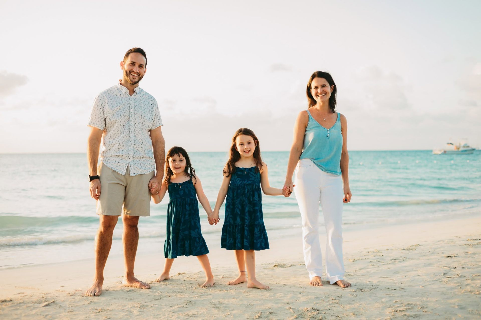 Amy Yale and her family on a sunlit beach